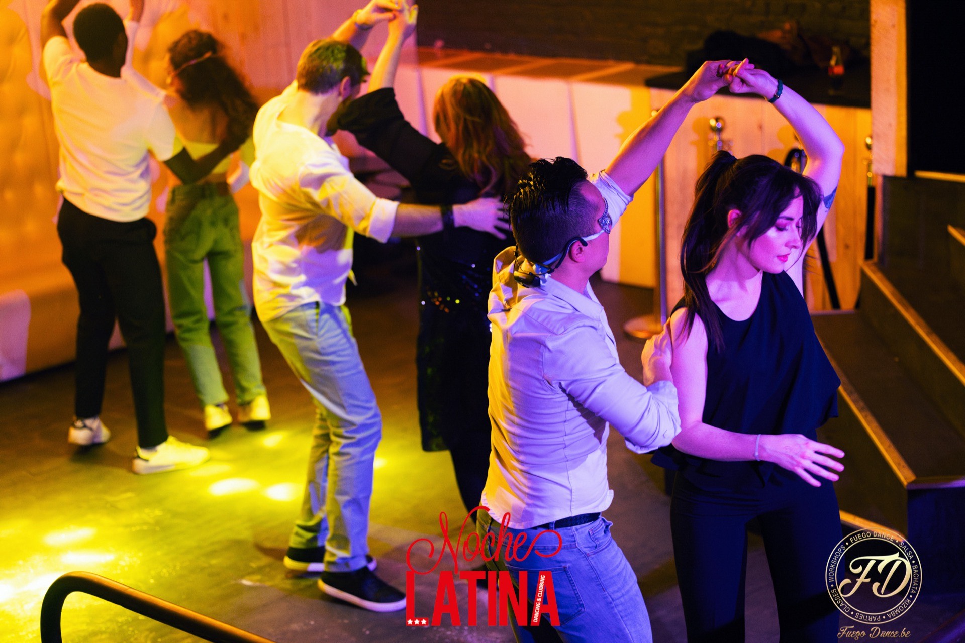 Couples dancing salsa